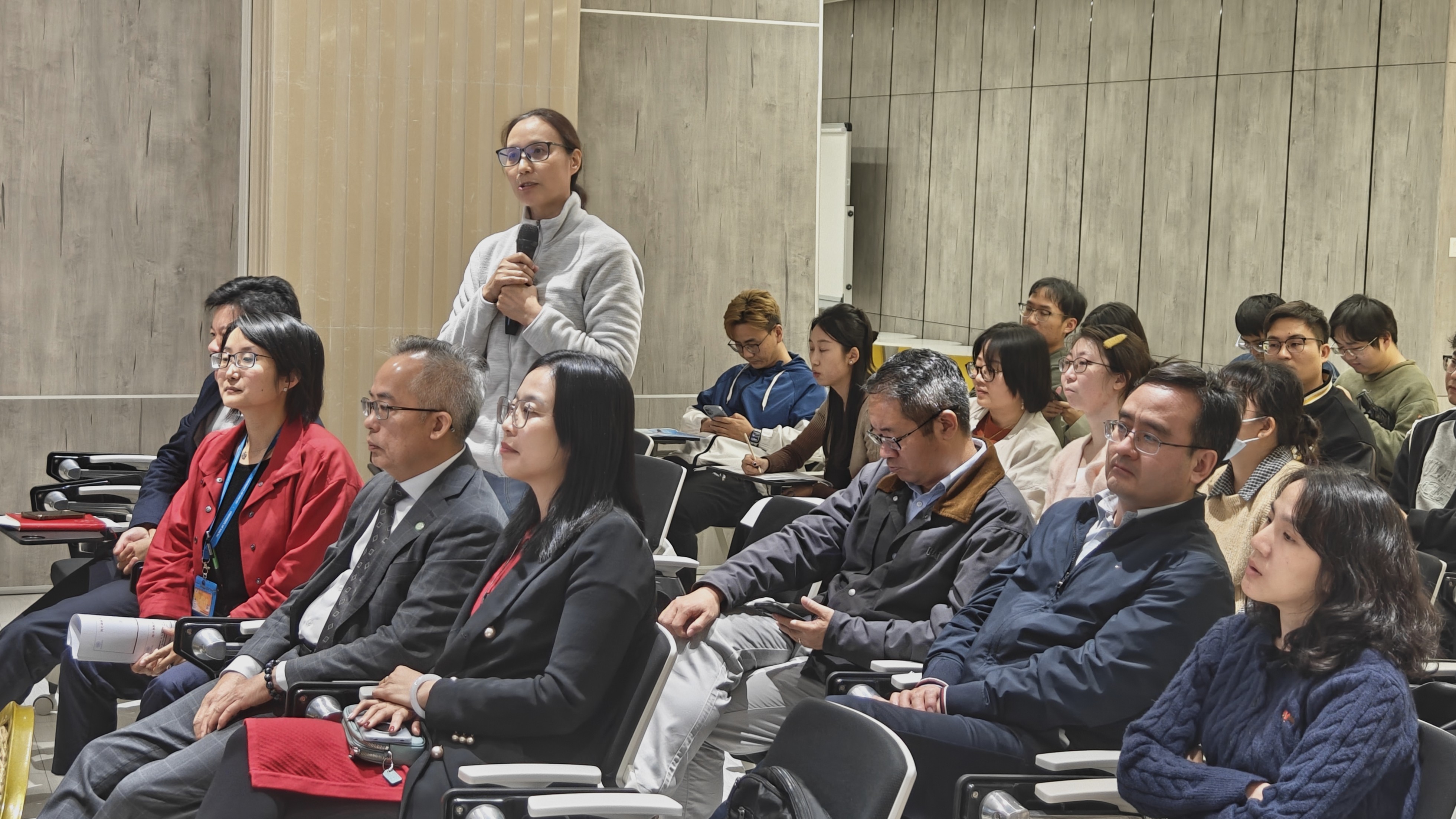 Attendees raising questions